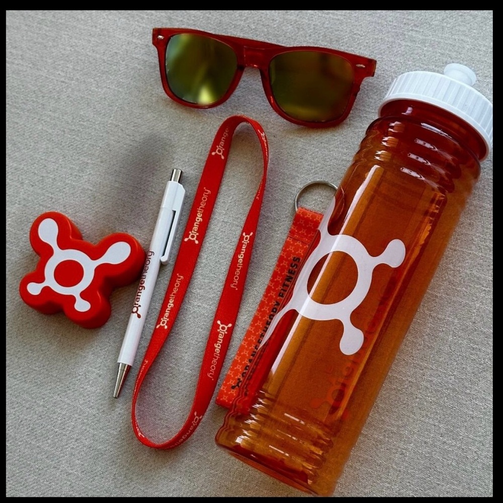 OTF Orangetheory swag bottle, headband, pen, sunglasses keychain, bag, stickers